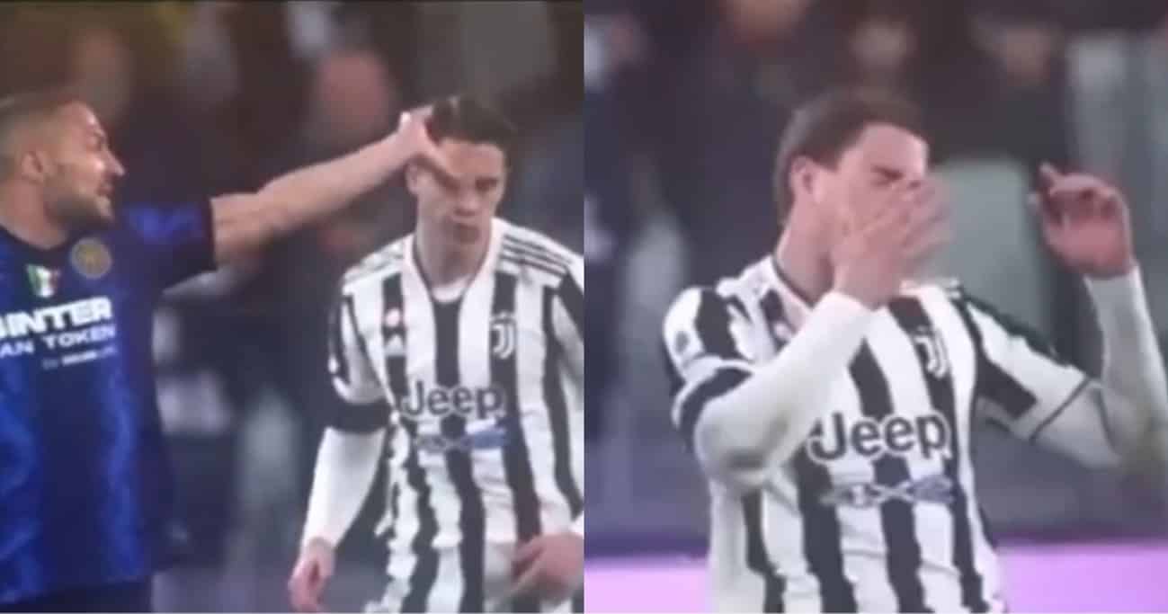 Sceneggiata di Vlahovic contro l’Inter, D’Ambrosio lo sfiora e lui si butta a terra con le mani sulla faccia